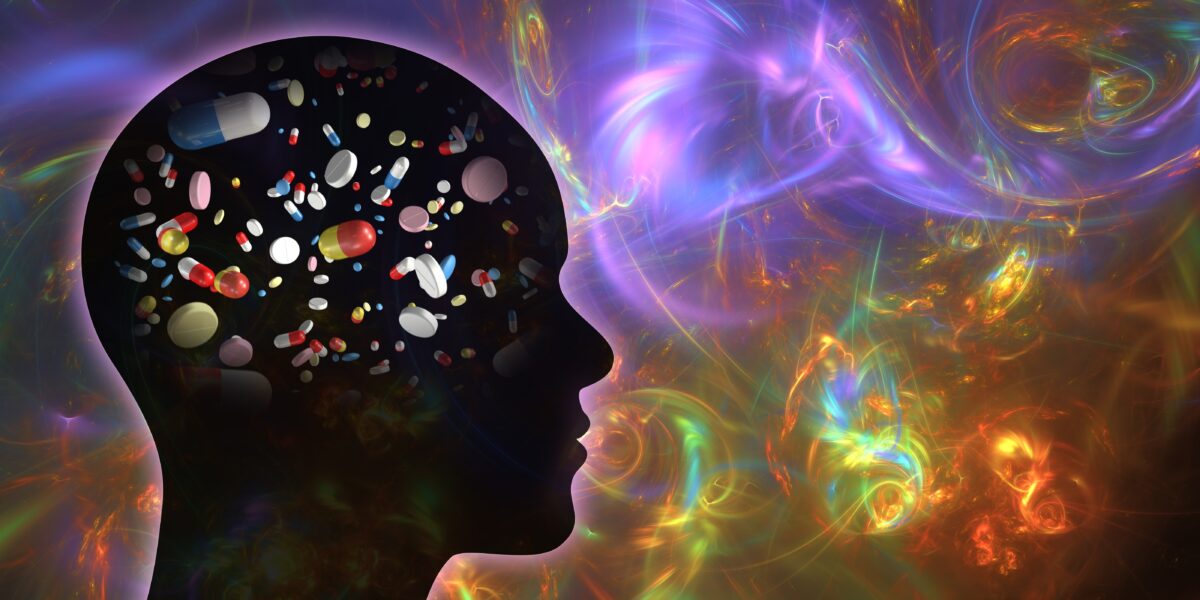 3d,Pills,And,Capsules,In,Human,Brain,Head,Silhouette,With